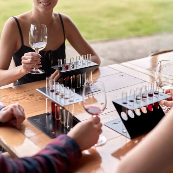 a woman sitting at a picnic table