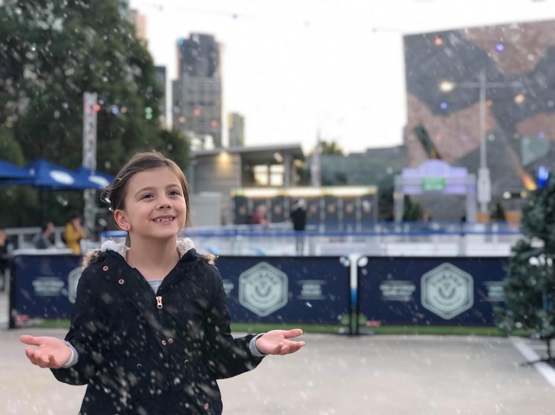 a person standing in front of a building