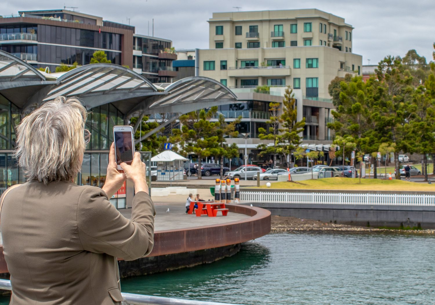 IMG_1867-2 a person standing on a boat in the water