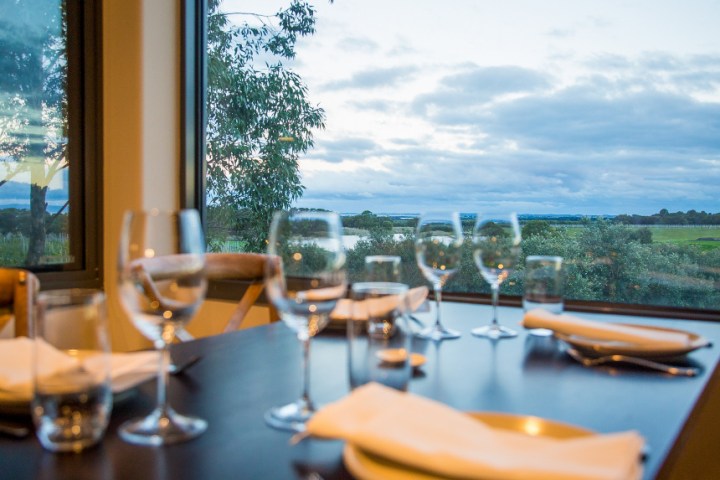 a room filled with furniture and a large window
