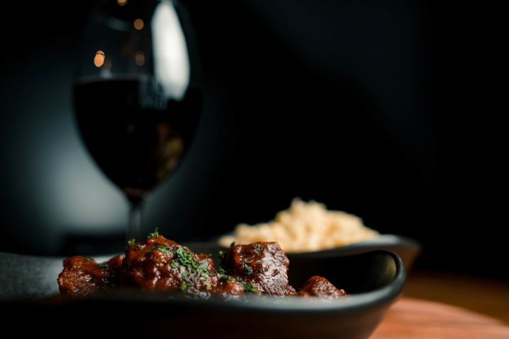 a close up of a bowl of food on a plate