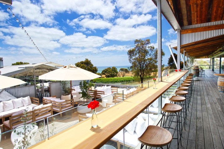 a wooden dock in front of a building