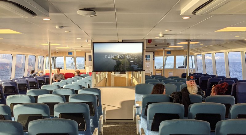 Digital-Screen a room filled with furniture and a bus