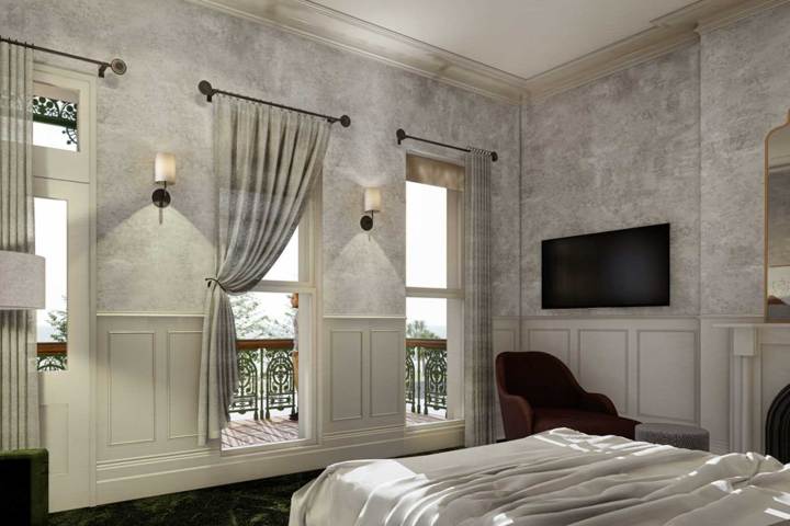 a bedroom with a large bed in a room