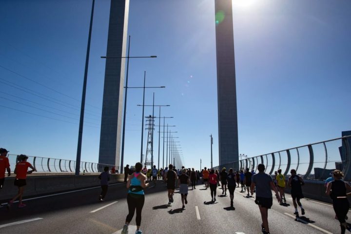 a group of people walking down the street