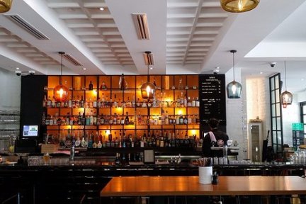 a kitchen with a table in a restaurant