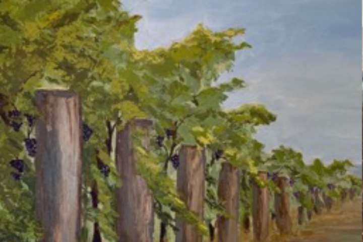 a tree next to a body of water