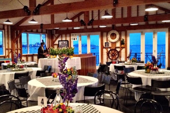 a dining room table in front of a window