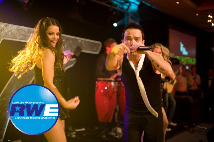 a person standing in front of a mirror posing for the camera