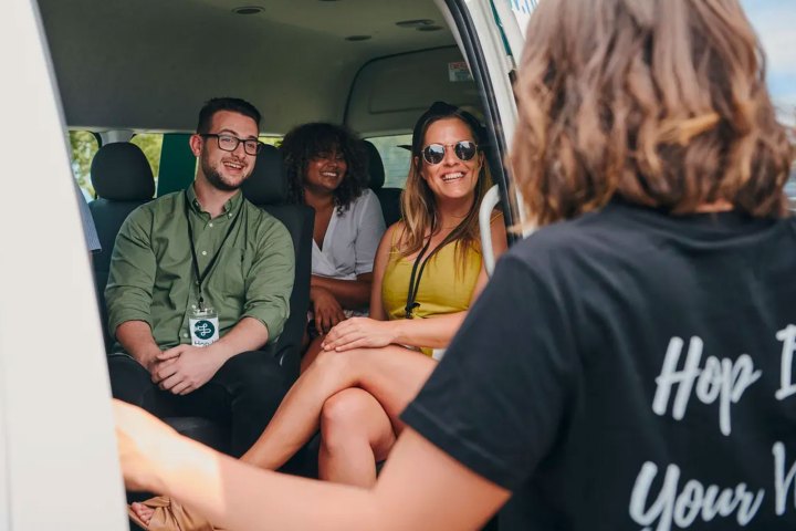 a group of people sitting posing for the camera