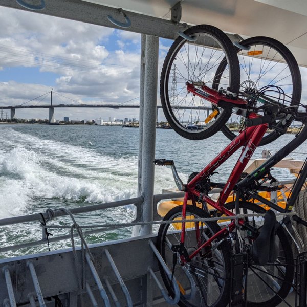 a bicycle is parked near a fence