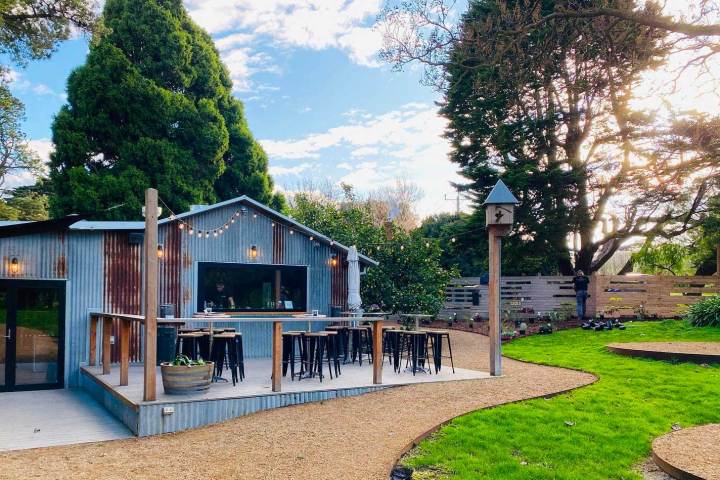 a house with trees in the background
