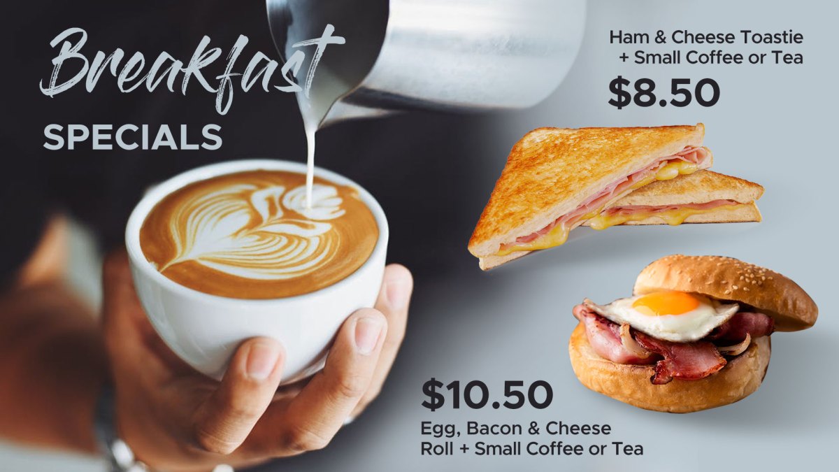 a breakfast sandwich and a cup of coffee