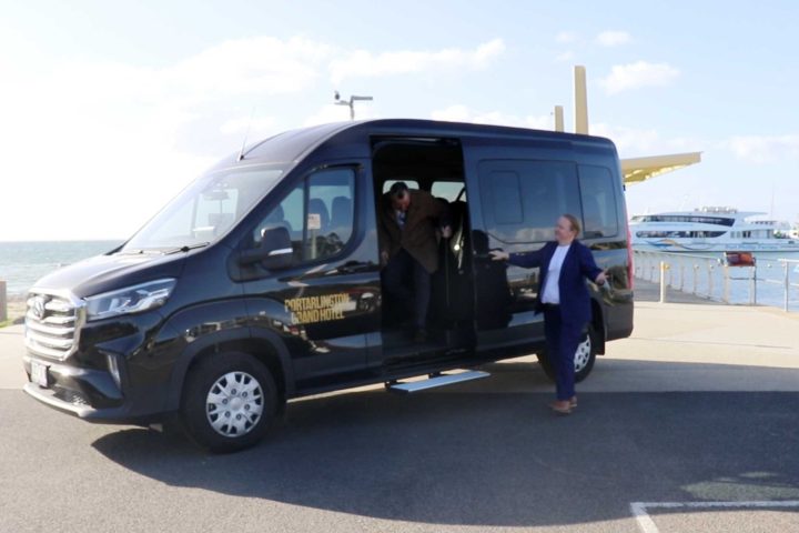 a man riding on the back of a truck