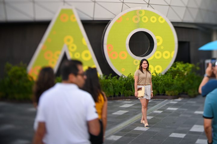 a person standing in front of a building