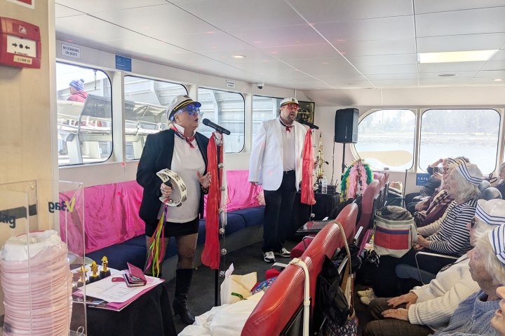 a group of people standing in a room