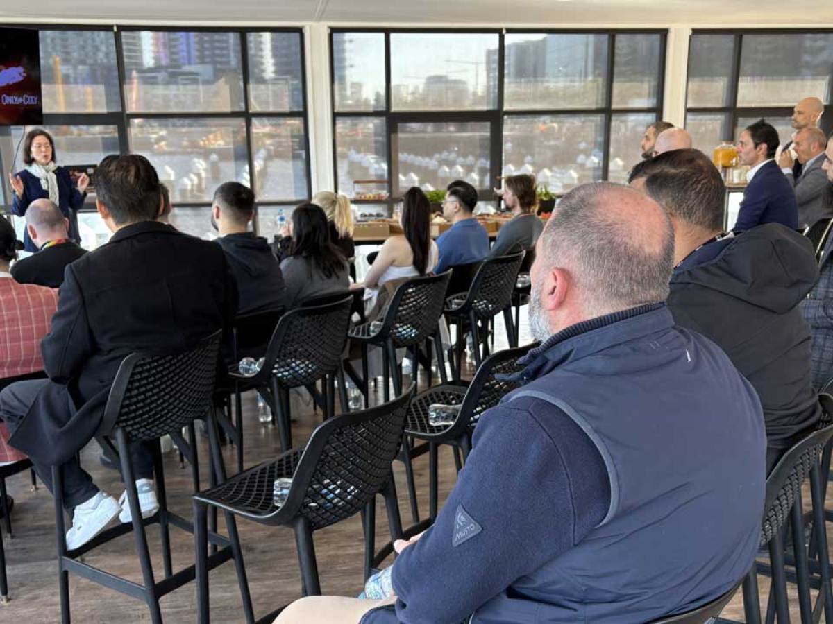a group of people sitting at a table in a restaurant