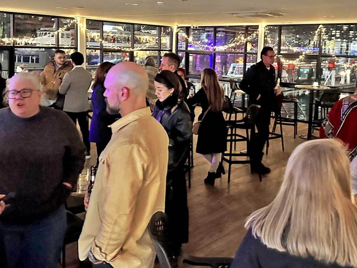 a group of people standing in front of a store